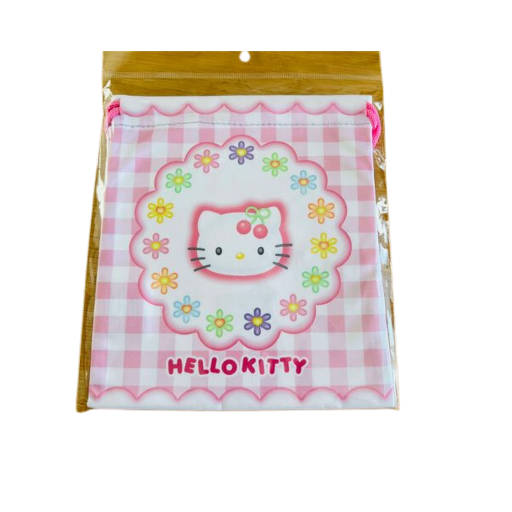 Drawstring bag styled with retro 90s fashion accessories.