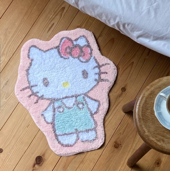 Sanrio Hello Kitty die-cut mat for cozy, charming decor; crafted from quality polyester and polyurethane for lasting comfort.