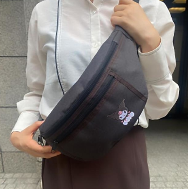Sanrio Kuromi waist bag showcasing a charming design with a handy external zipper pocket and adjustable belt.