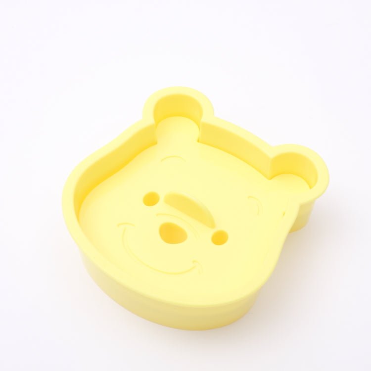 Versatile bread and cookie cutter with Winnie the Pooh design, made with durable heat-resistant polypropylene.